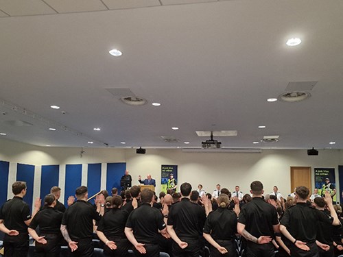 Oath of office Jackton with officers taking an oath