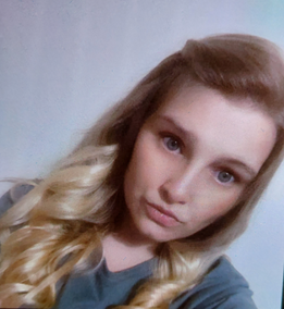 She is described as 5ft 2in tall, of average build with long fair hair which has pink through it.