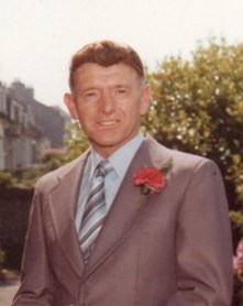 Image of George Murdoch outside with brown hair and a grey suit, who was murdered in Aberdeen on Thursday, 29 September, 1983.