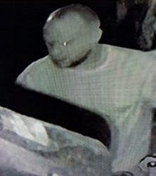 white man wearing white top CCTV image 3
