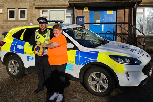 Lorna Medcalf from Keiran’s Legacy handing over the equipment to Constable Christopher Bain.
