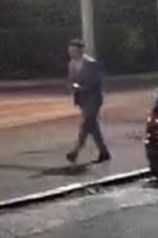 white, approximately 25-35 years old, with dark-coloured hair which was shaved at the back and sides. He was wearing a grey three-piece checked suit and black shoes