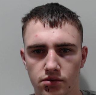 22-year-old white man with short, brown hair