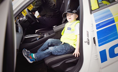 Anthony Green inside a police car