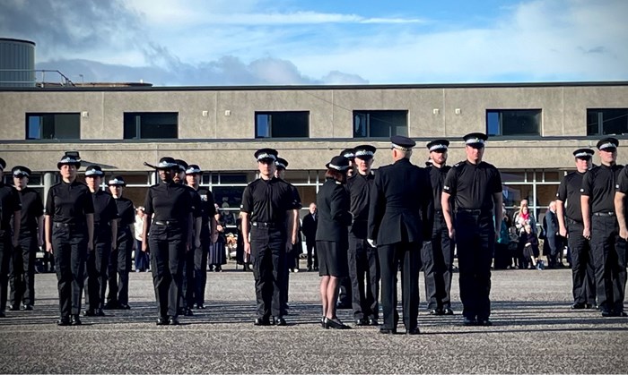 Probationers line up for inspection by Chief Constable Jo Farrell