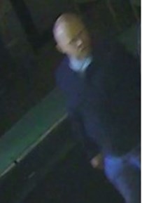 white man wearing dark-coloured clothing CCTV image 2