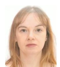 Passport photo / headshot of missing woman Katrina Fleming as descirbed in text